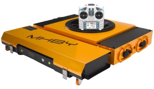 The Electric Machine Dolly Skate enables remote-controlled movement of loads up to 50 tonnes, eliminating the need for additional push or pull equipment. Its three-point support design allows simultaneous driving and steering at speeds up to 8 m/min, with precise speed adjustment and safe positioning via the remote control’s single-joystick proportional function. Powered by state-of-the-art 48 V, 60 Ah lithium-iron phosphate batteries, the Electric Machine Dolly Skate delivers a minimum 3-hour runtime under full load and can negotiate gradients of 2–3%.