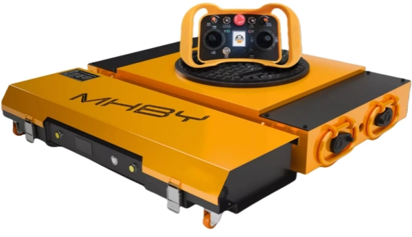 The Electric Machine Dolly Skate enables remote-controlled movement of loads up to 50 tonnes, eliminating the need for additional push or pull equipment. Its three-point support design allows simultaneous driving and steering at speeds up to 8 m/min, with precise speed adjustment and safe positioning via the remote control’s single-joystick proportional function. Powered by state-of-the-art 48 V, 60 Ah lithium-iron phosphate batteries, the Electric Machine Dolly Skate delivers a minimum 3-hour runtime under full load and can negotiate gradients of 2–3%.